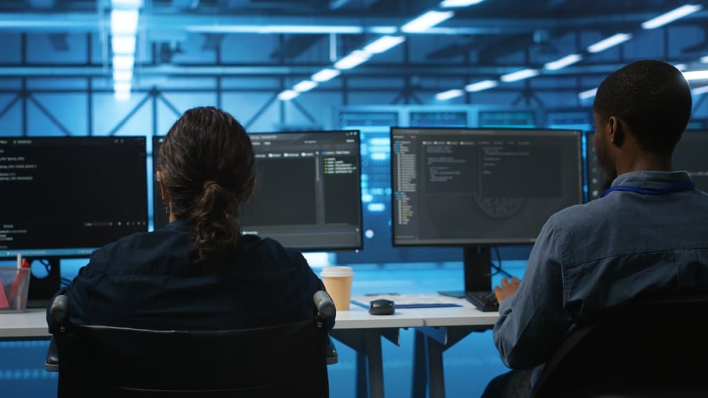 A team of techs working at a data storage facility